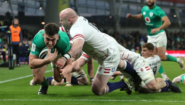 Dan Sheehan of Ireland dives past Dan Cole to score his second and Ireland