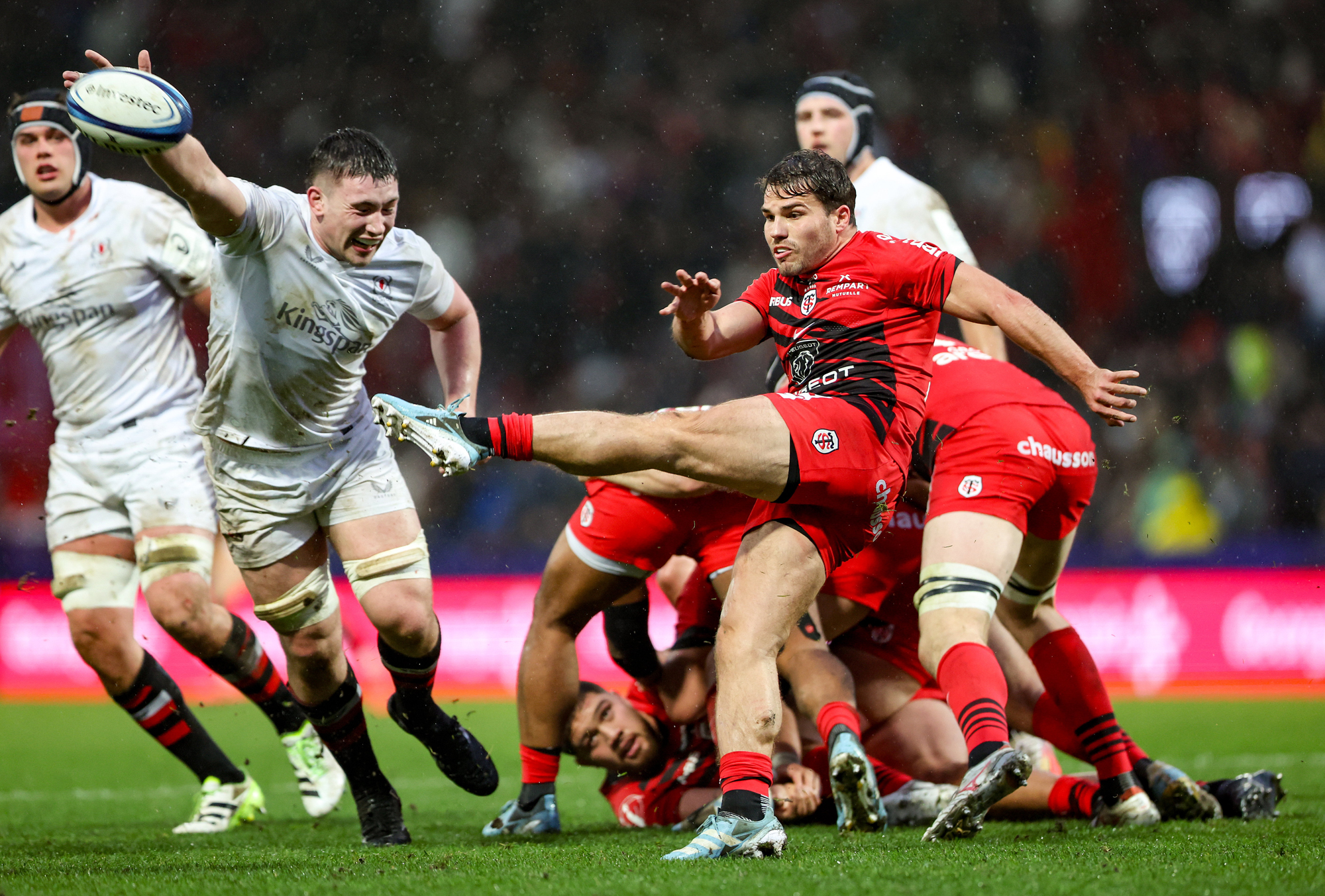 Antoine Dupont of Toulouse executes a box kick during his team