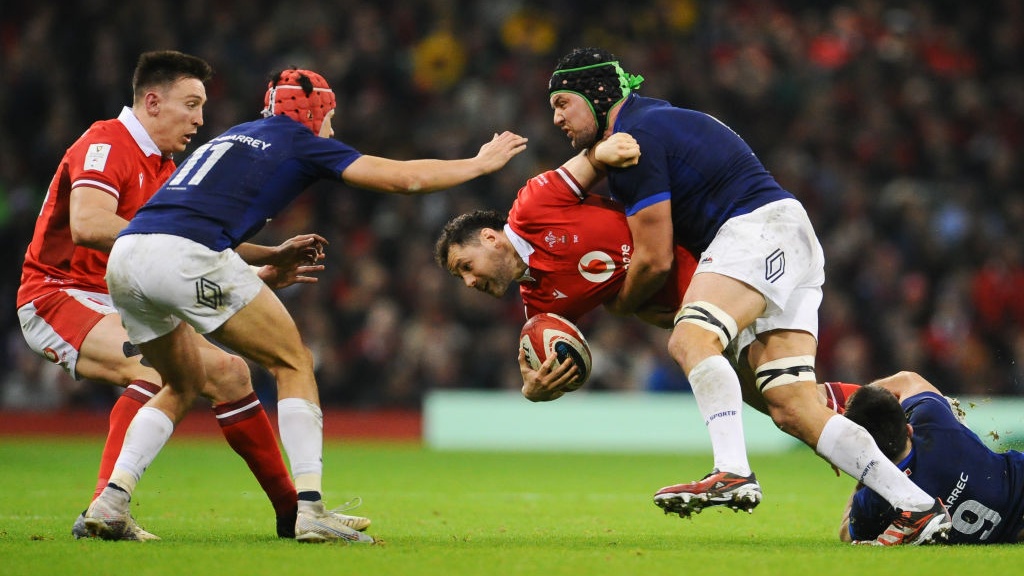 Wales Tomos Williams is tackled by France