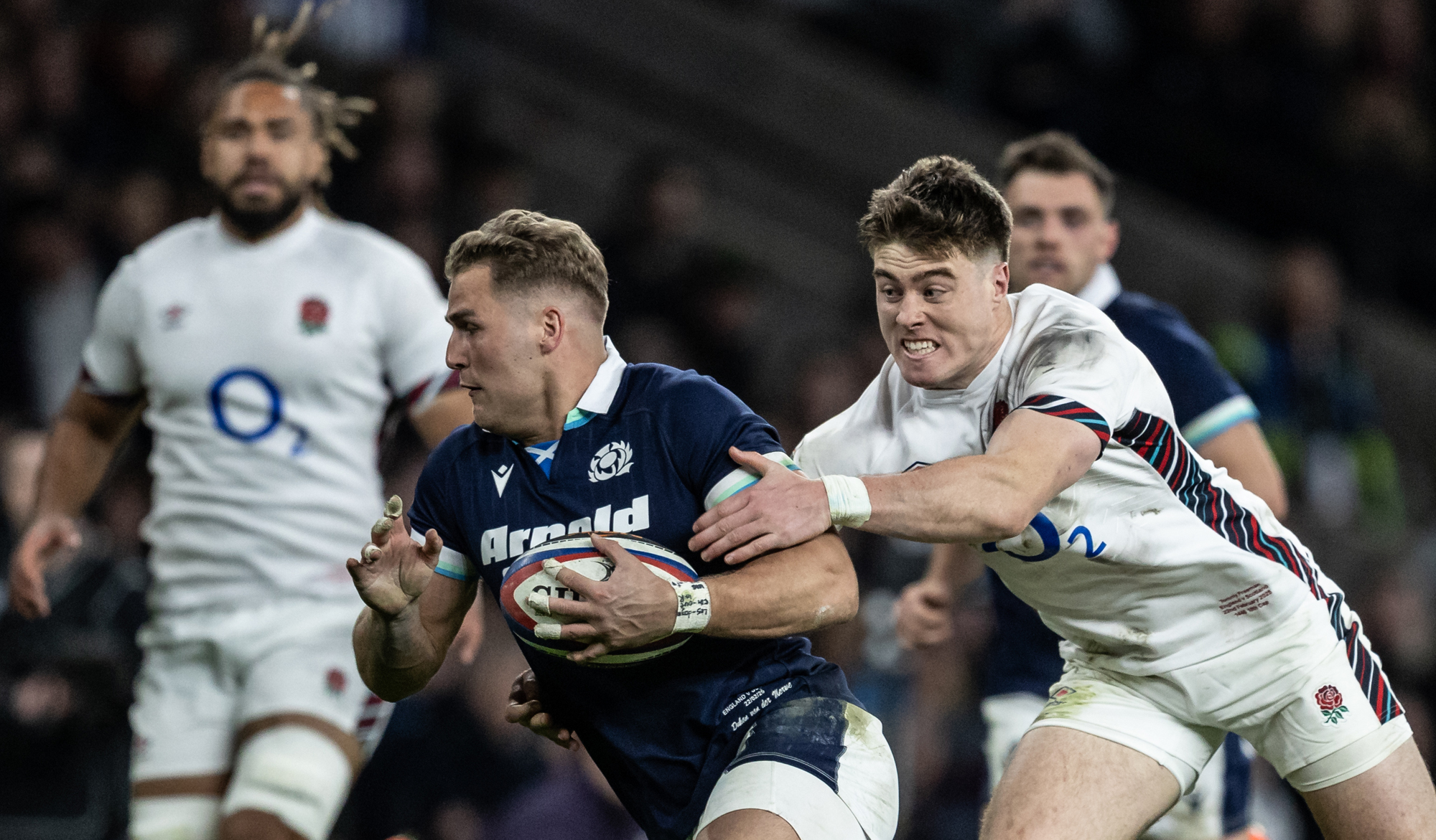 England’s Tommy Freeman tackles Scotland’s Duhan van der Merwe during the 2025 Guinness Six Nations match