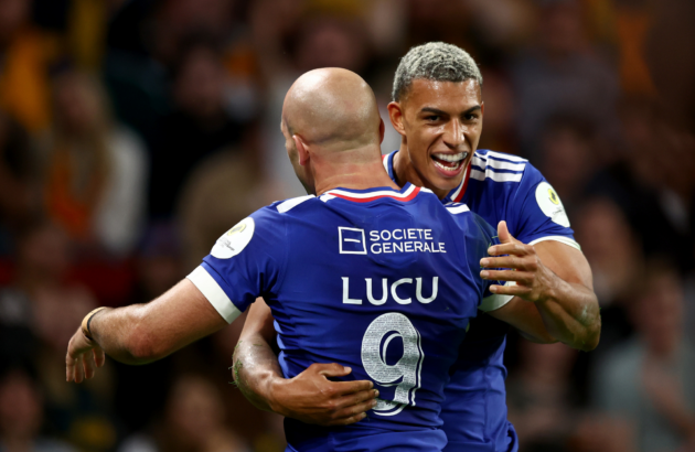Aaron Grandidier-Nkanang of France is congratulated by Maxime Lucu after scoring a try during the Nations Championship match between Australia Wallabies and France at Suncorp Stadium on July 11, 2026 in Brisbane, Australia.
